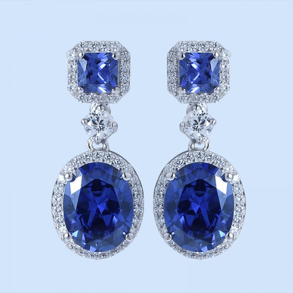 女性のための流行の銀製のイヤリング上の楕円形の青いタンザナイトロジウム 